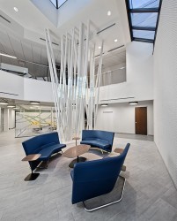 Entrance lounge area with architectural component designed using Sonoco’s Sonotubes®