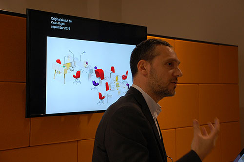 Mr. Malhan presenting his open work concept to a group of designers