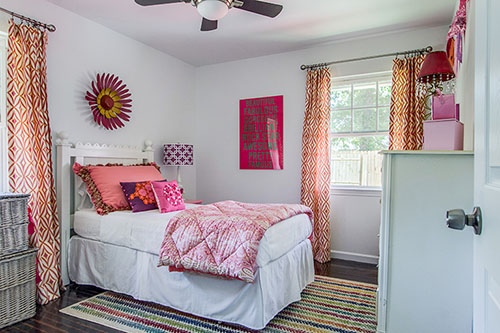 A girlâs bedroom as designed and furnished by Dwell with Dignity. Photo by Lance Selgo at Unique Exposure Photography