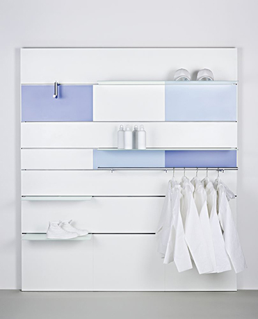 The Invisible 6PL wall mount system with integral lighting. One of Vitra Retail’s Transversal Elements