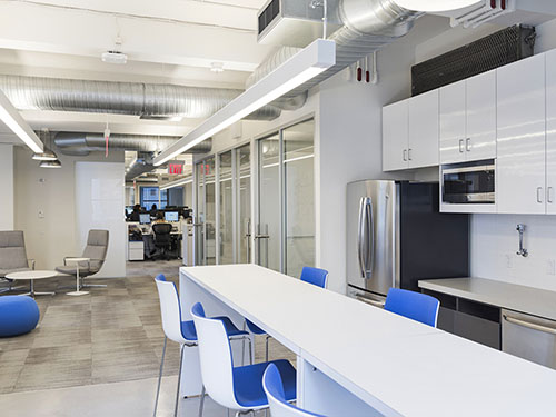 A large multi-purpose lounge area and pantry provides an additional space for informal social events, presentations and meetings as well as access to an outdoor terrace. Photo: by Sasha Maslov 