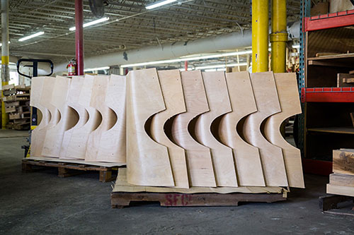 Molded plywood shells provide internal structure for the newly designed Ala Wing Chair.