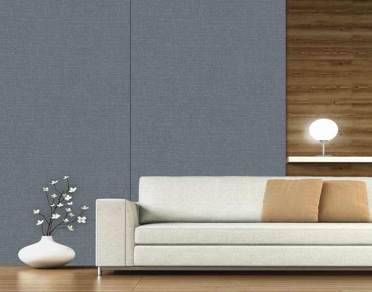 Decorated living room with sofa on hardwood floor.
